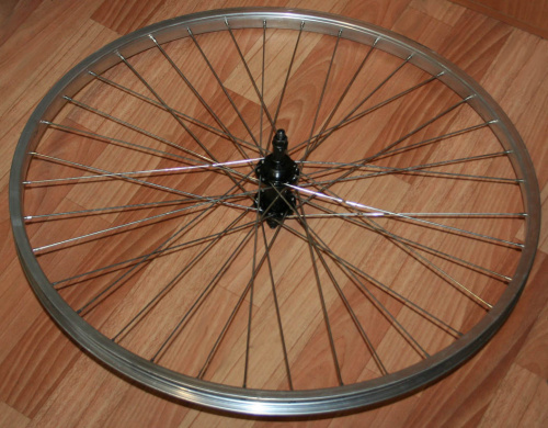 Колесо заднее 20", обод одинарный, под трещетку 6-7 скор, 36 спиц, 3/8" (гайка), серебристое.  для велосипеда